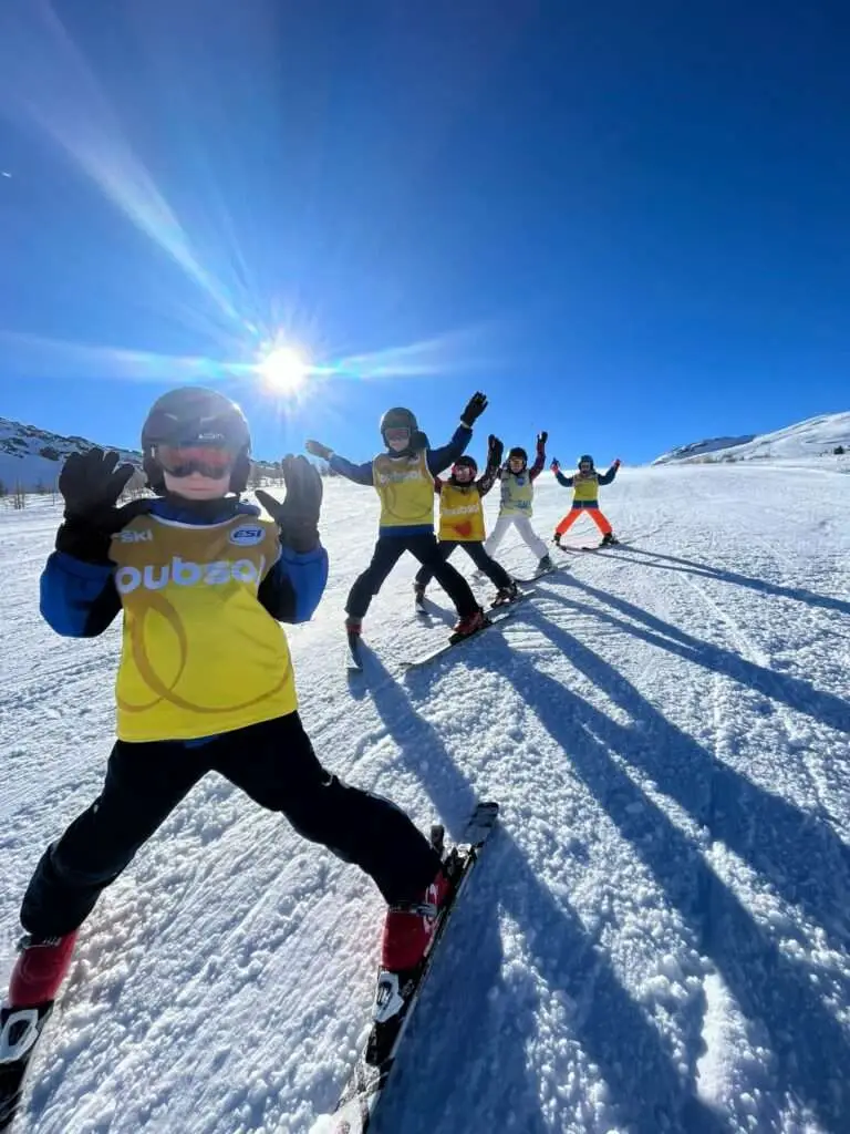 group of kids skiing in Montgenevre